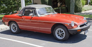 Red 1975 MG convertible