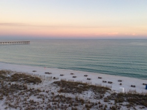 Sunset on beach behind Margaritaville Hotel, Pensacola Beach, FL, by Judy K. Walker