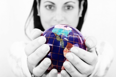 “Woman Holding World In Hands” by David Castillo Dominici on freedigitalphotos.net