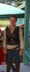 Judy K. Walker wearing homemade Firefly vest and holster at Halloween