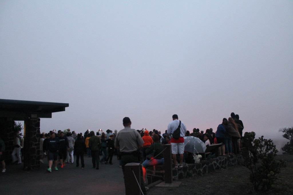 Crowd at Jaggar Museum looking at caldera by Judy K. Walker