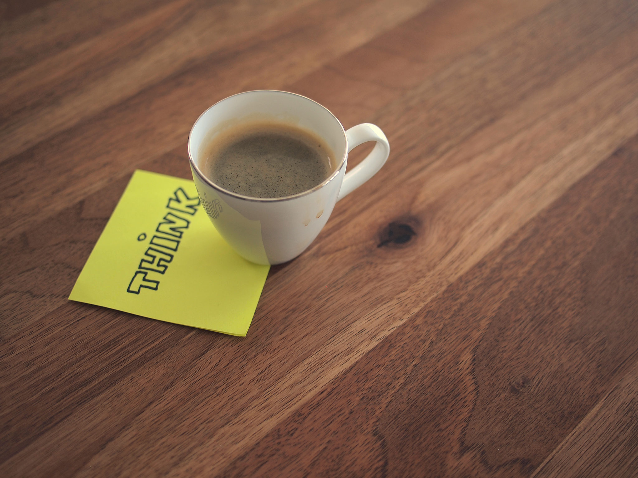 Espresso on "Think" sticky note by Daria Nepriakhina