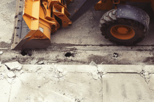 Bulldozer next to sidewalk by Leeroy from stocksnap.io