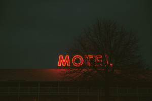 Motel sign at night by Benjamin Combs from stocksnap.io