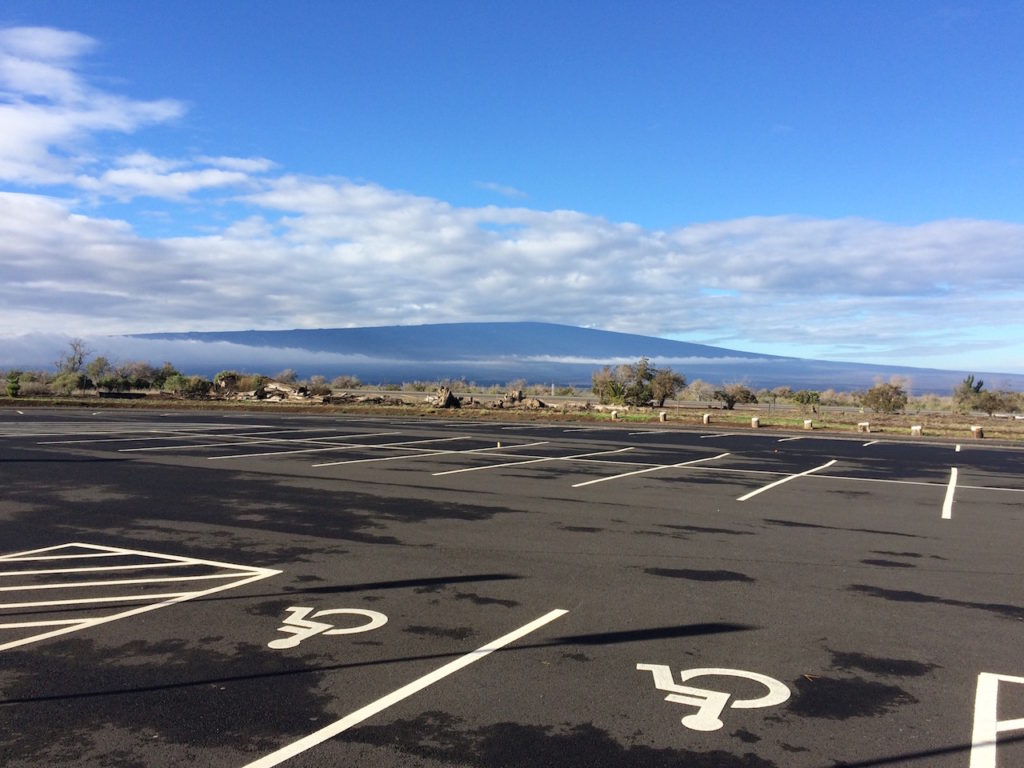 Parking lot at Mauna Kea rest stop on Saddle Road by Paul Normann