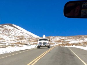 Pickup truck with snowman on the back by Judy K. Walker