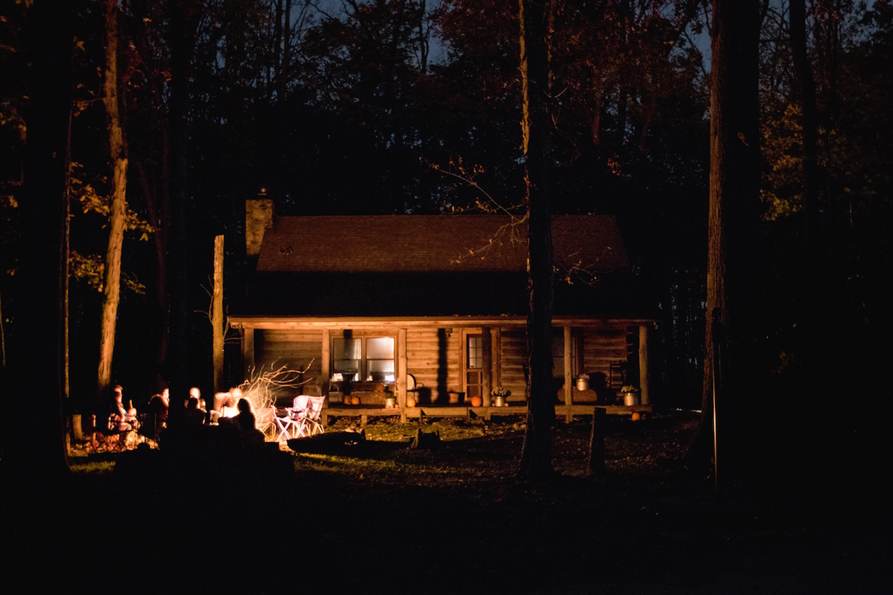 Cabin with fire at night by Teddy Kelley from stocksnap.io