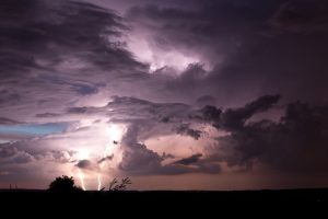 Thunderstorm with lightning flashing in the clouds