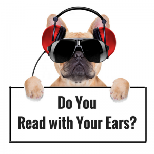 Dog wearing headphones asking, Do you read with your ears?